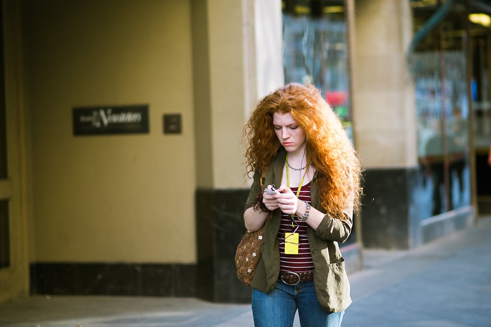 Girl walking with a phone Girl walking with a phone