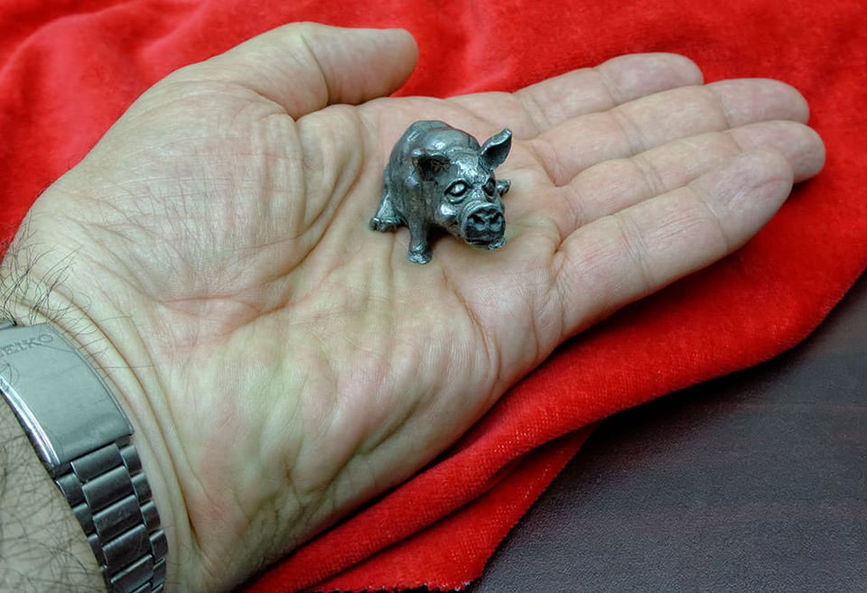 Pewter Pig in Palm of Hand