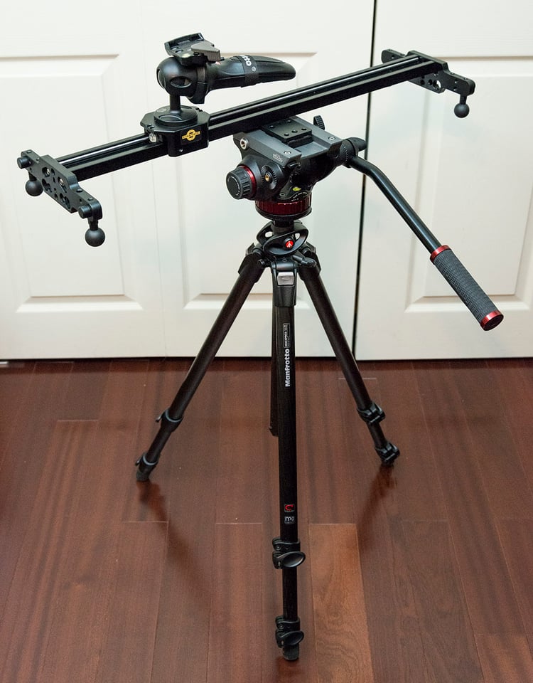 tripod with fluid video head and camera slider