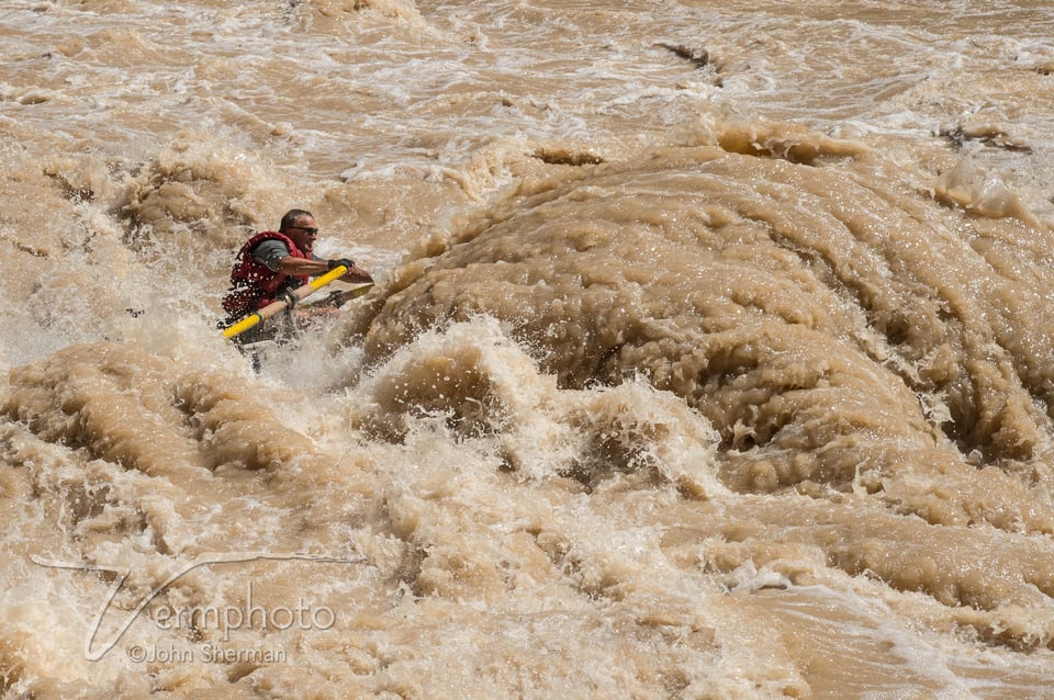 Rafter running Lava Falls, Grand Canyon.