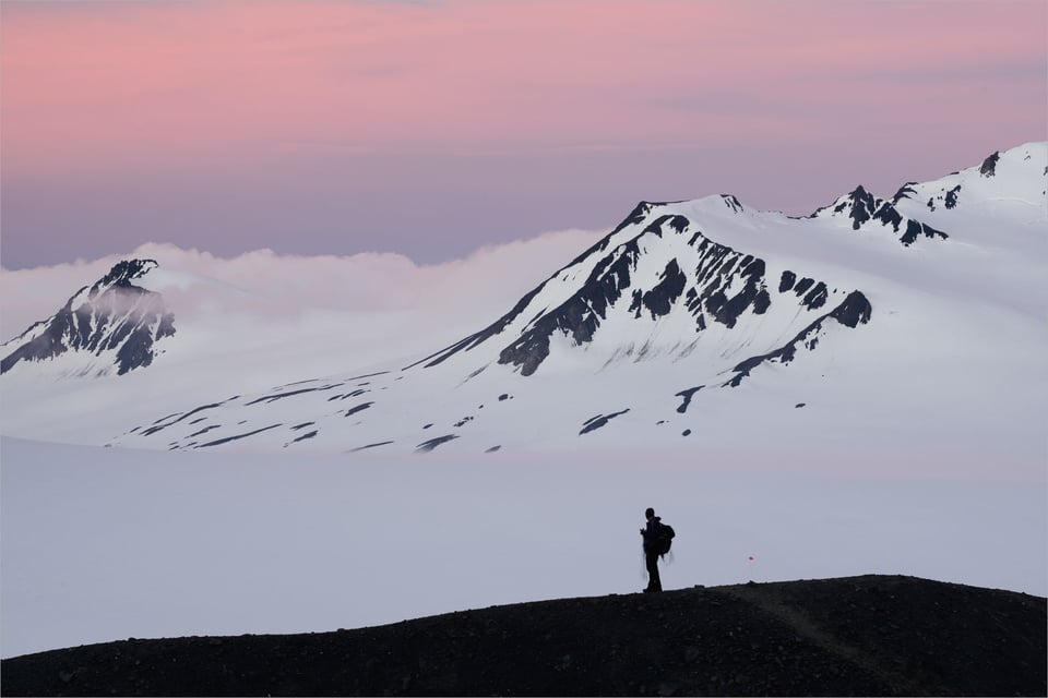 Hiker with camera backpack