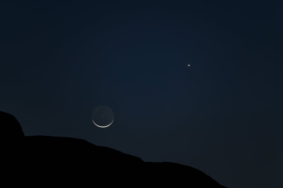 Crescent moon and Venus with some foreground