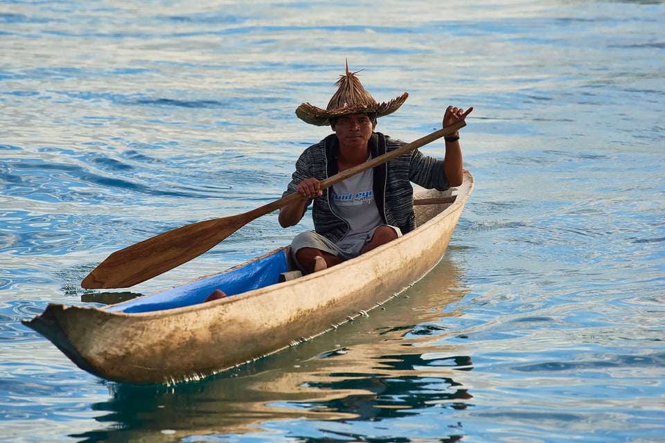 Indonesian in a boat