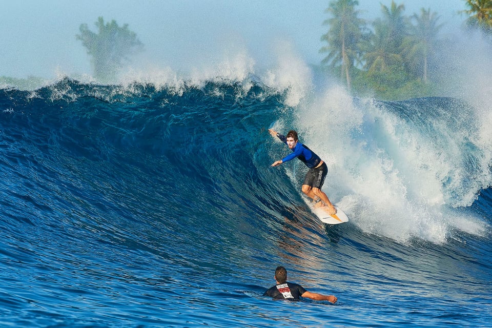 Surfer in a large wave