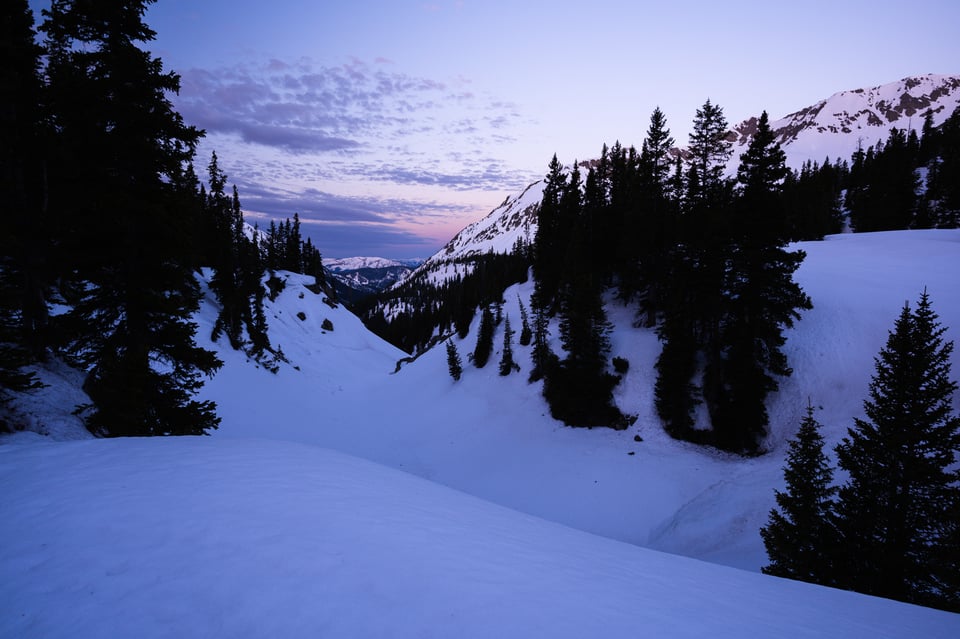 Snowy Landscape with Distant Mountains