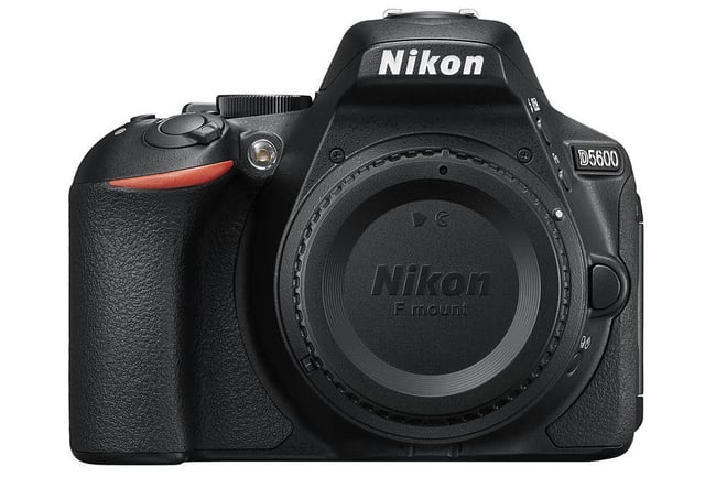 Nikon D5600 front view. The D5600 is a 24 megapixel entry-level Nikon DSLR with a DX sensor and a tilt-flip LCD.