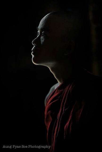Low light profile of a monk inside a Bagan temple