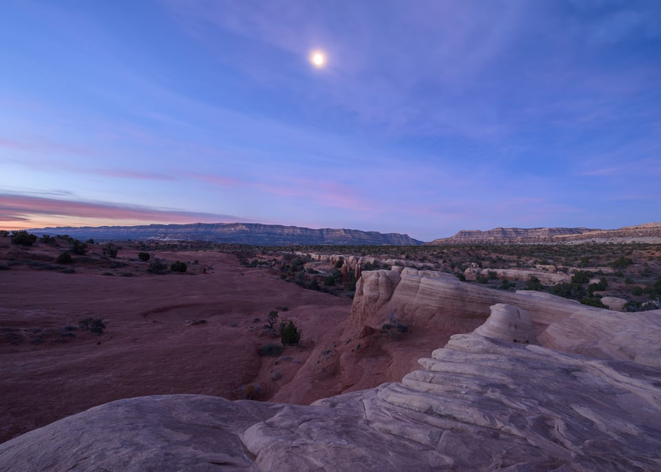 This landscape photo shows the moon over Escalante in Utah, taken with the Nikon 14-24mm f/2.8 AF-S zoom.