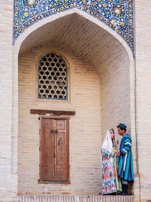 Married couple in traditional Bukharian clothes, Uzbekistan