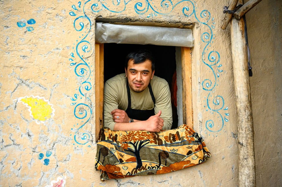 A Baker making tandoori sambusas in Margilan, Uzbekistan