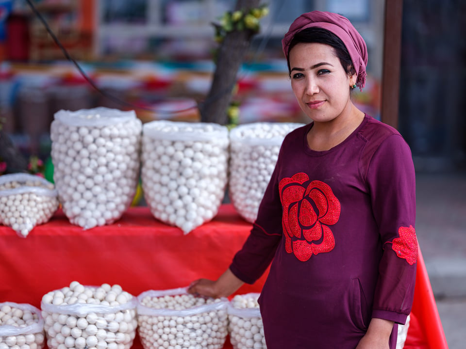 A woman selling Qurut in Namangan, Uzbekistan