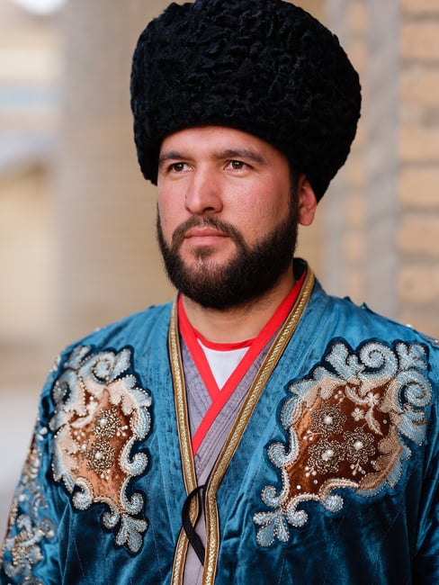 A royal guard of Khiva wearing a blue cloak