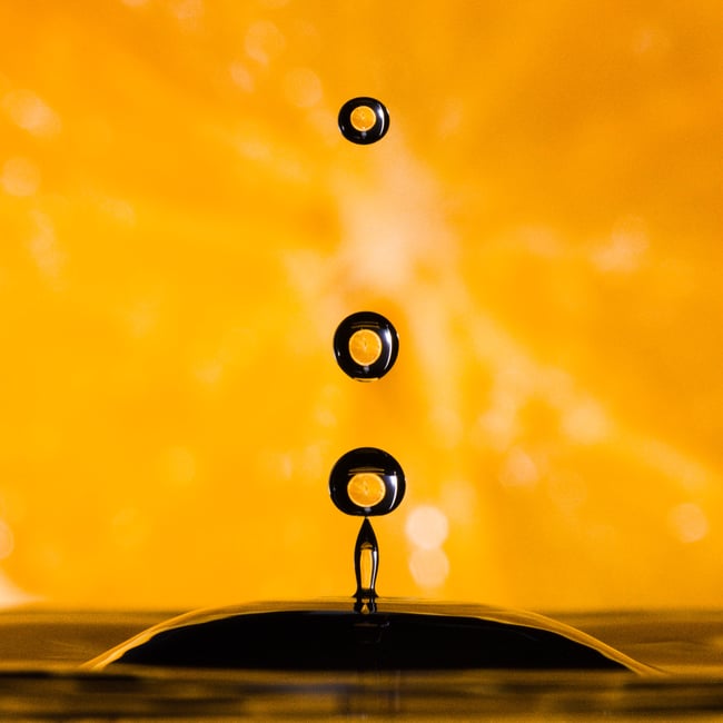 Water droplets with orange background
