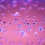 Bubbles on a pink background with a cool texture