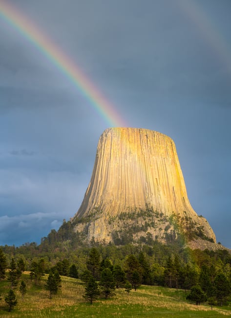 Devils Tower rainbow in rain