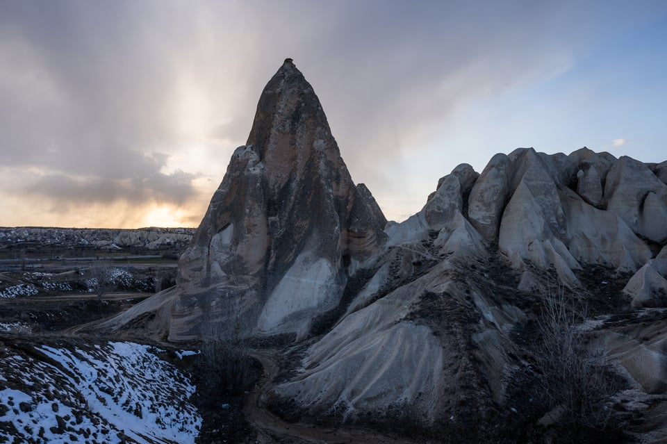 Boring landscape photo of rock formation at sunset