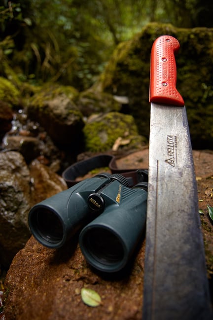 binoculars and machete