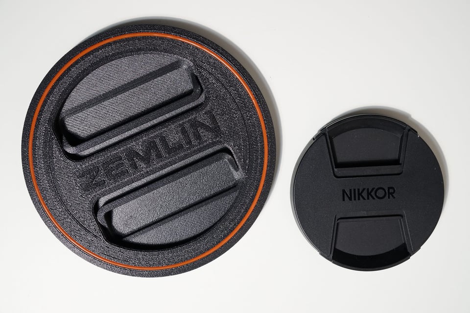 600s-lens-cap