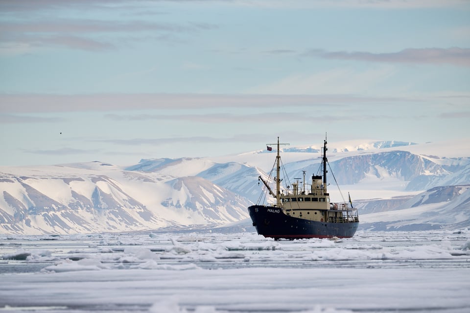 Ship surrounded by ice