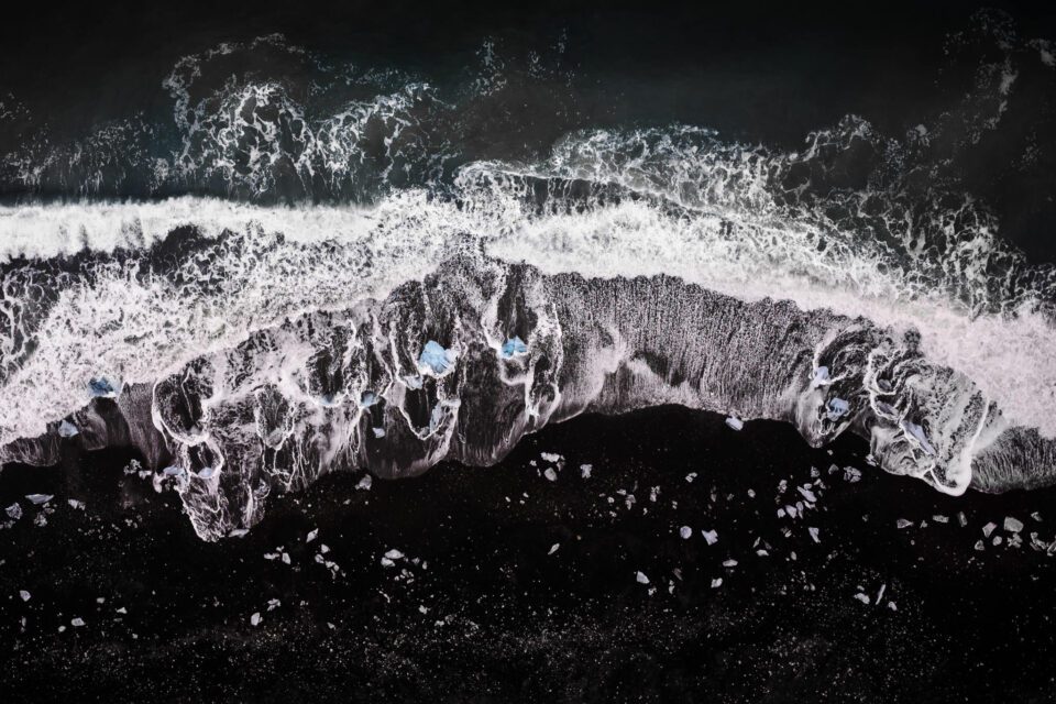 This aerial photograph of Jokulsarlon beach in Iceland was taken with the Nikon Coolpix A, a discontinued DX camera with a fixed 18.5mm prime lens.