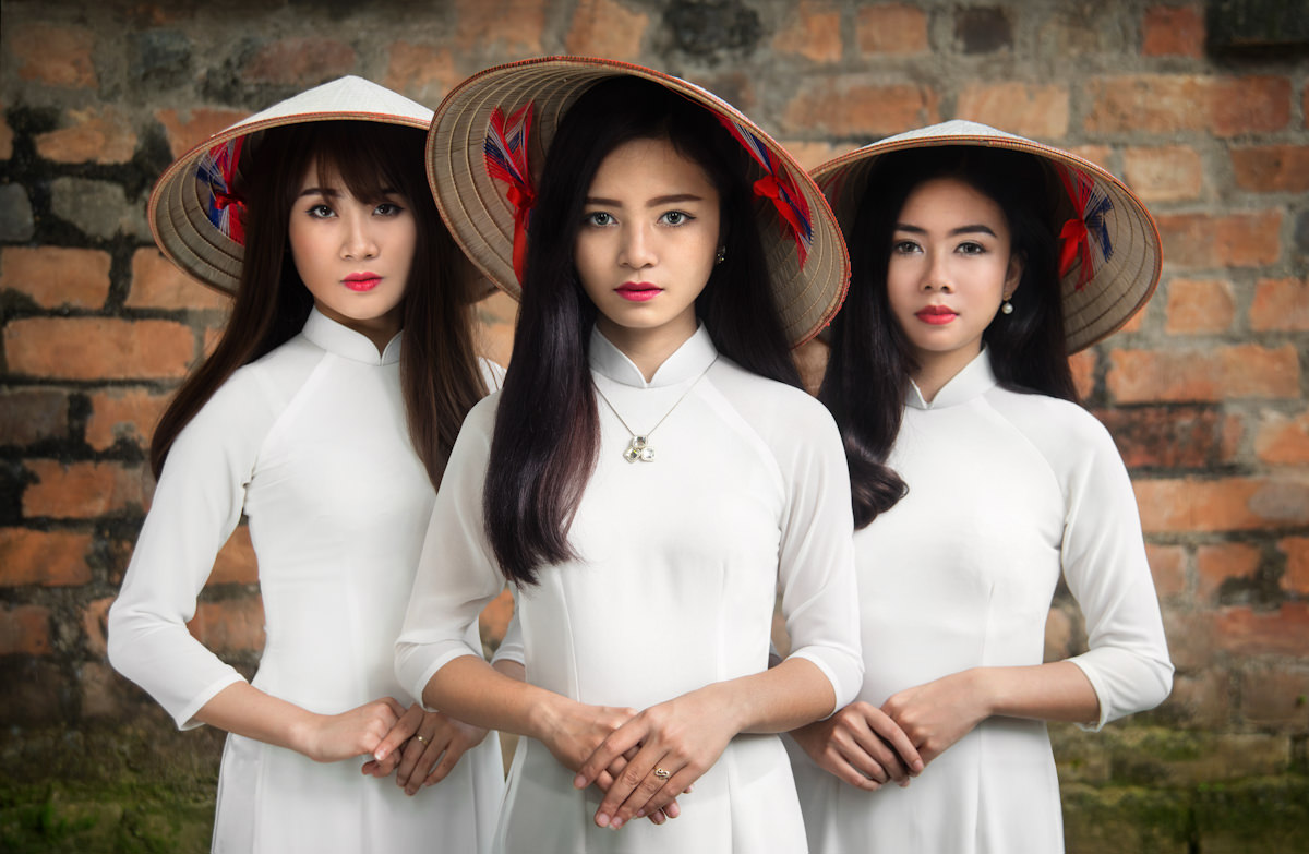 Ladies in White - White is the pure, classical color of the ao dai. 