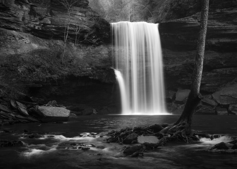 An black and white image of a waterfall