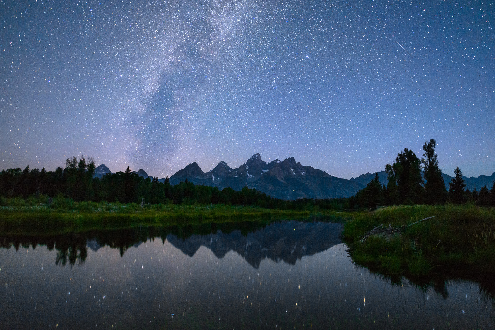 Mléčná dráha nad národním parkem Grand Teton