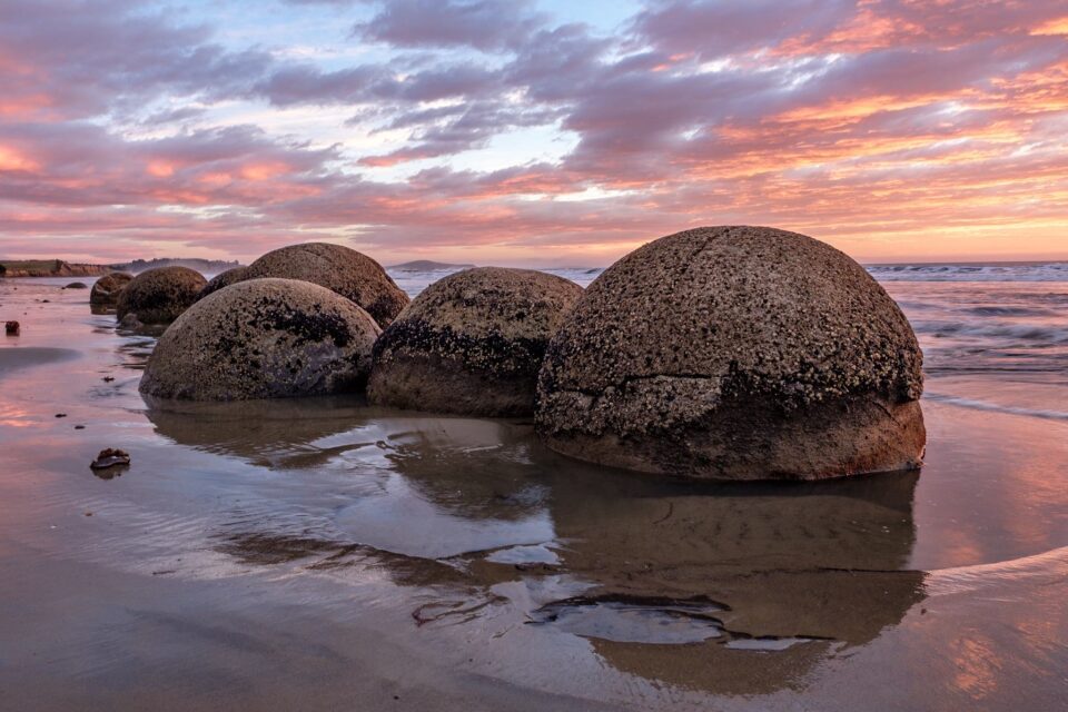 Moeraki Boulders, New Zealand. I intentionally processed the image to be bright and vibrant in colors.