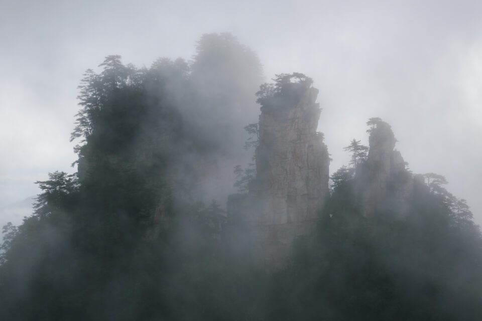 The Nikon D3500 works well for landscape and travel photography because it is so lightweight. This photo shows Zhangjiajie in China with mist and fog in the morning.