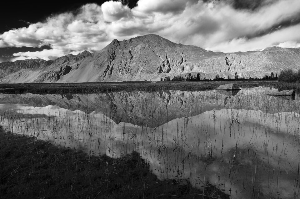 Black and white reflection shot with beautiful clouds