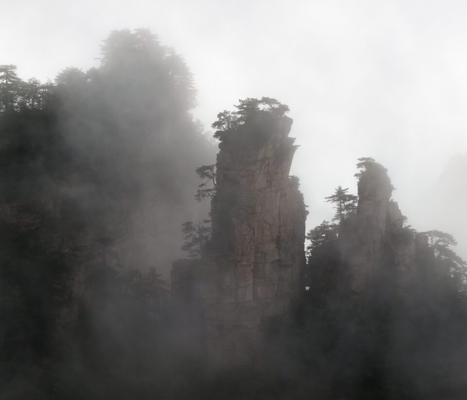 This photo shows the beautiful mountains of Zhangjiajie in China on a foggy morning.