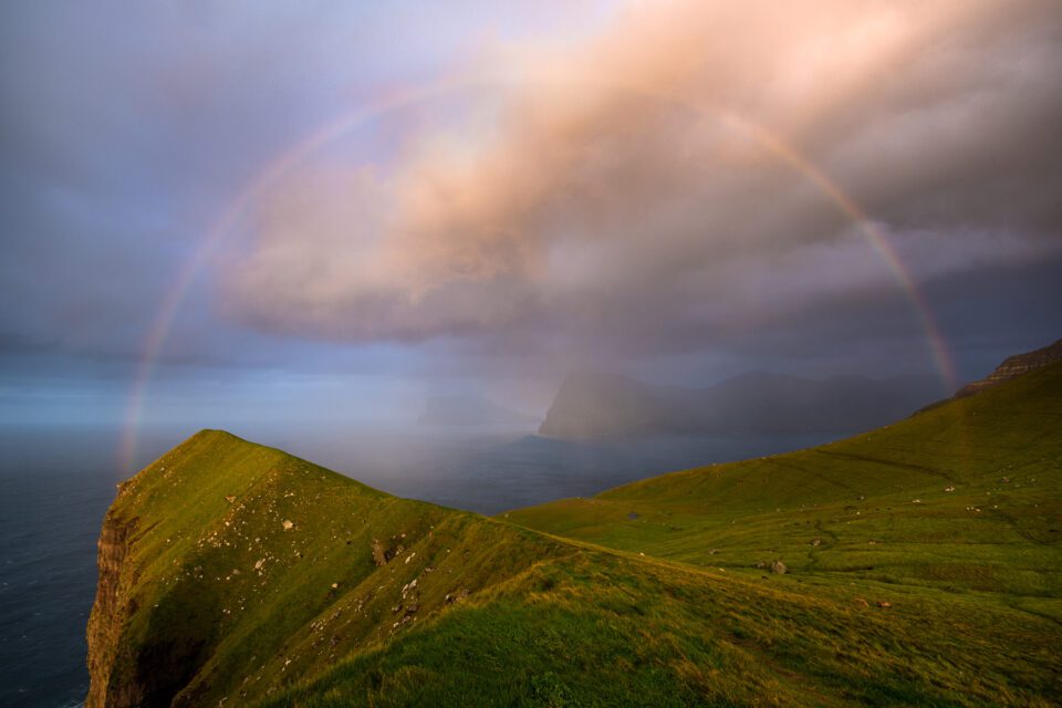 14mm is wide enough that a rainbow easily fits in the frame. I took this photo on Kalsoy in the Faroe Islands using the Nikon Z 14-30mm f/4 at its widest focal length.