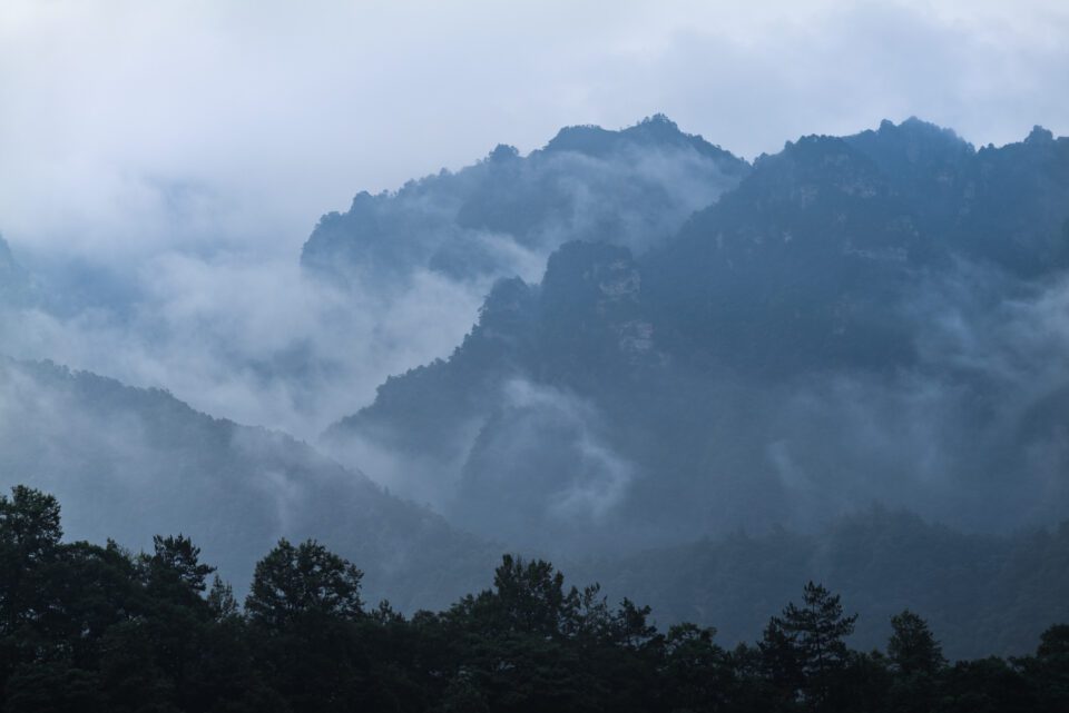 Mountains in China on a misty morning, taken from a distance with the Panasonic S1R.