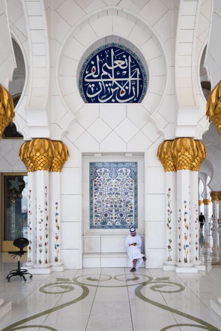 Man Sitting at Grand Mosque, Abu Dhabi, UAE