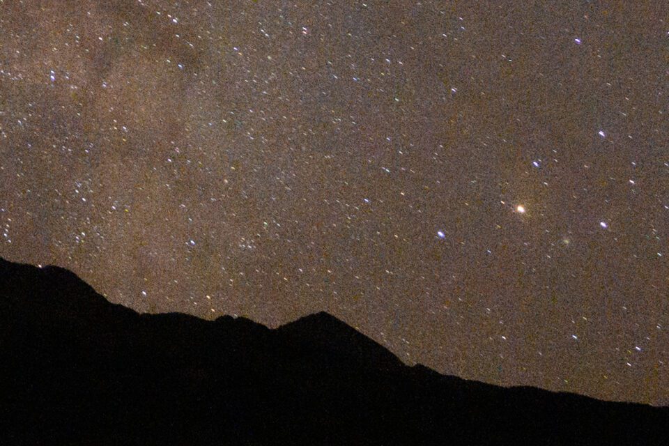 100% crop of Milky Way photo with small star trails at 14mm and 20 seconds