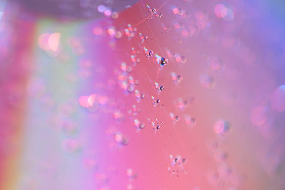Close-up photo of a CD with water droplets macro photography idea