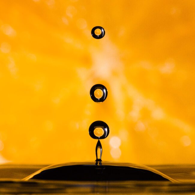 Water droplets with orange background