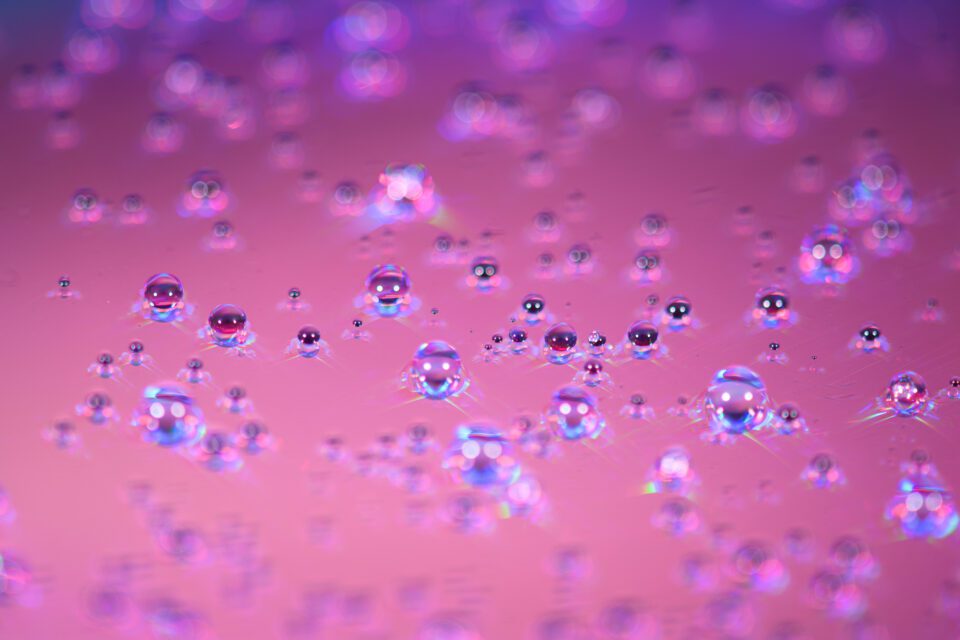 Bubbles on a pink background with a cool texture