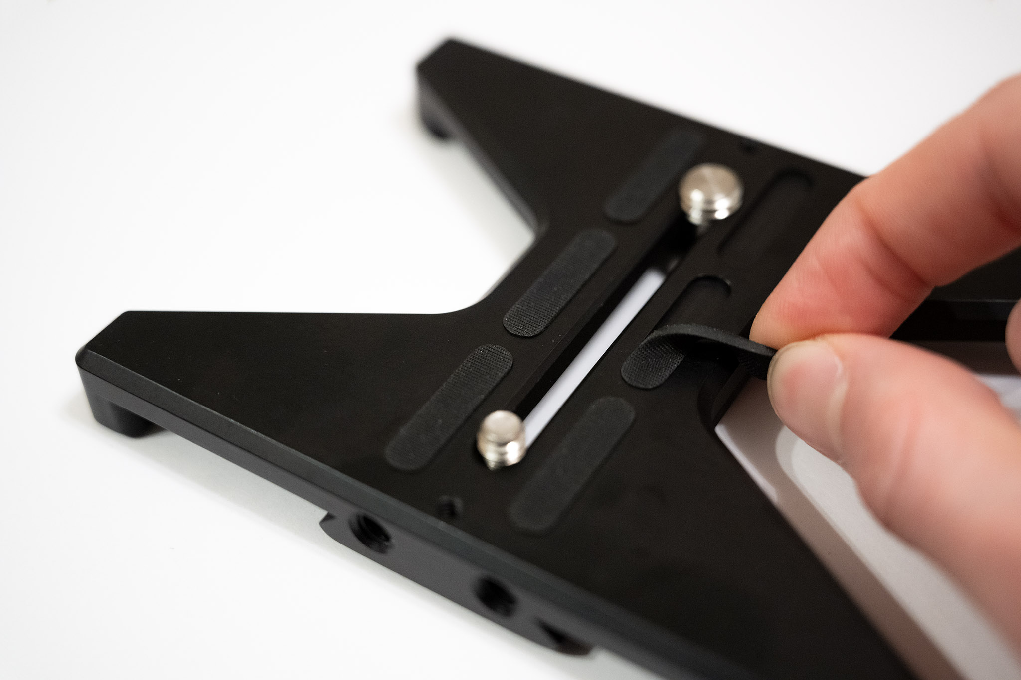 Remove Rubber Tabs from Tripod Plate