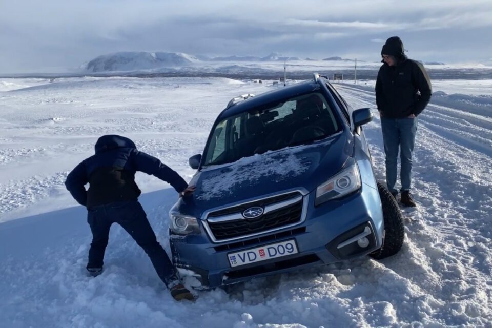 Driving the car off the road in Iceland during winter