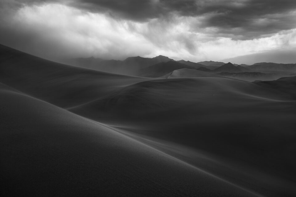 Monochrome variation of sand dune sandstorm photo Death Valley